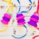 students making mini piñatas for Hispanic Heritage Month after-school activity