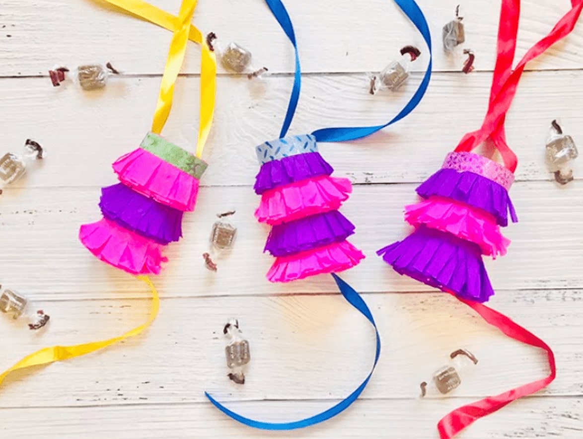 students making mini piñatas for Hispanic Heritage Month after-school activity